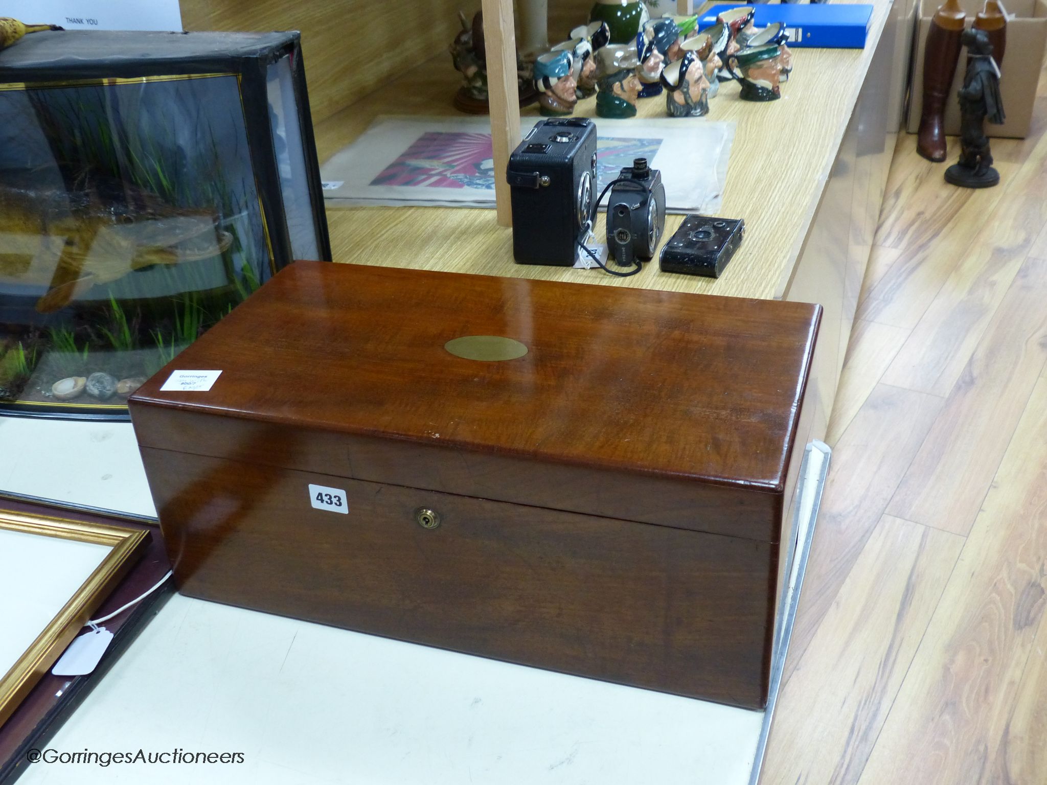 A large 19th century mahogany and brass mounted writing slope, by J J Mechi, London, 50 x 20cm